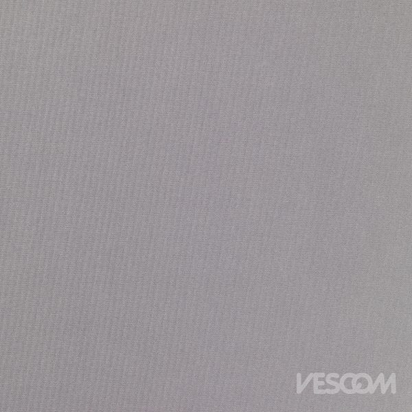 Dimmer 00, geweven verduisterend gordijnstof in effen kleur.